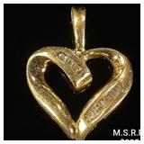 1.4 DWT 10 KT Gold Heart Pendant w/ Diamond 1.4 DWT 10 KT Gold Heart Pendant w/ Diamond