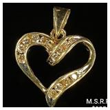 1.4 DWT 10 KT Gold Heart Pendant w/ Diamond 1.4 DWT 10 KT Gold Heart Pendant w/ Diamond