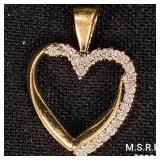 1.4 DWT 10 KT Gold Heart Pendant w/ Diamond 1.4 DWT 10 KT Gold Heart Pendant w/ Diamond