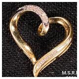 0.8 DWT 10 KT Gold Heart Pendant w/ Diamond 0.8 DWT 10 KT Gold Heart Pendant w/ Diamond