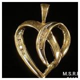 1.2 DWT 10 KT Gold Heart Pendant w/ Diamond 1.2 DWT 10 KT Gold Heart Pendant w/ Diamond