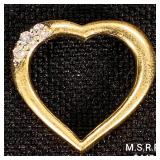 0.7 DWT 10 KT Gold Heart Pendant w/ Diamonds 0.7 DWT 10 KT Gold Heart Pendant w/ Diamonds