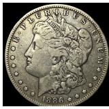 1886-O Silver Morgan Dollar ABOUT UNCIRCULATED