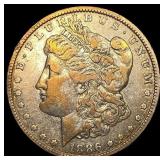 1886-O Silver Morgan Dollar ABOUT UNCIRCULATED
