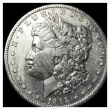 This is a 1902 Morgan Silver Dollar. CHOICE AU