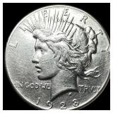 1928 Silver Peace Dollar NEARLY UNCIRCULATED