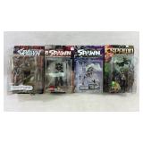 Four Spawn Action Figures in Original Packaging