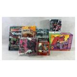 Assortment of action figures from spawn transforme
