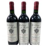 (3) Sealed 1990 La Dame de Montrose Wine Bottles