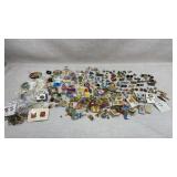 Large collections of pins, cufflinks and other