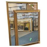 Gold framed wall mirrors by Windsor Art Products.