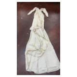 vintage-style long-sleeved silk wedding dress