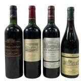 (4) sealed Collectors bottles of wine