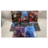 collection of hardback rulebooks and adventure
