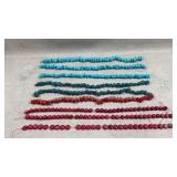 loose strands of red coral and turquoise beads.