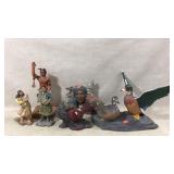 Glass bird  and Native American figurines