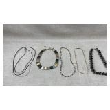 collection of various necklaces, including a