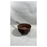 antique cast iron footed skillet