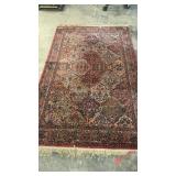 Karastan Area Rug with Floral Motif and Fringe