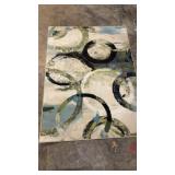 Abstract Pattern Area Rug With Circular Design
