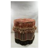 beautifully upholstered, octagon-shaped ottoman