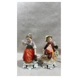 pair of vintage porcelain figural lamps