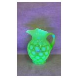 Fenton Art Glass pitcher in a green opalescent
