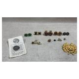 collection of various vintage jewelry items,