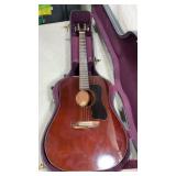vintage Guild D-25M acoustic guitars from the