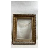 ornate antique gold picture frame constructed