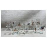 collection of vintage souvenir beer glasses from