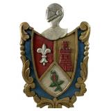 carved wood coat of arms wall sculpture