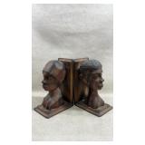 vintage, hand-carved wooden bookends featuring