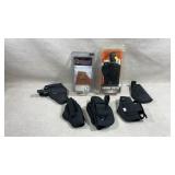 several tactical pistol gun holsters designed