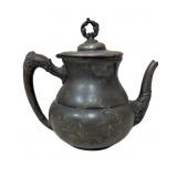 vintage silver-plated teapot manufactured by the