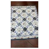 unbranded blue star quilt featuring floral and