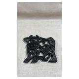 black cast iron cow trivet