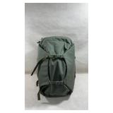Osprey Porter 30 travel backpack in a haybale