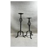 vintage wrought iron candle holders featuring a