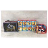 Toys and lunch tin