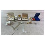 Assortment of costume jewelry & silver pendant
