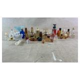 Assortment of perfume & cologne bottles some h