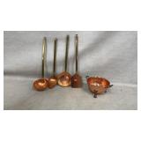 Copper kitchen tools with brass handles