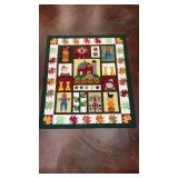 handmade autumn-themed quilt