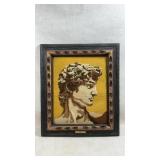 vintage framed needlepoint artwork depicts a