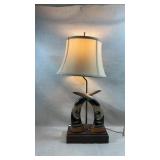 vintage carved carved horn table lamp featuring
