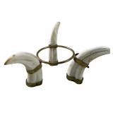 African warthog tusk tripod stand