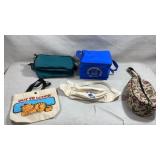 collection of vintage bags and lunch carriers