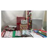 holiday wrapping setup features a festive