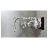 large vintage resin sculpture titled "The Swing"